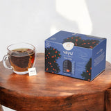 Vayu Earl Grey Tea Box with a cup of Tea