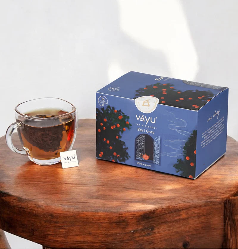Vayu Earl Grey Tea Box with a cup of Tea
